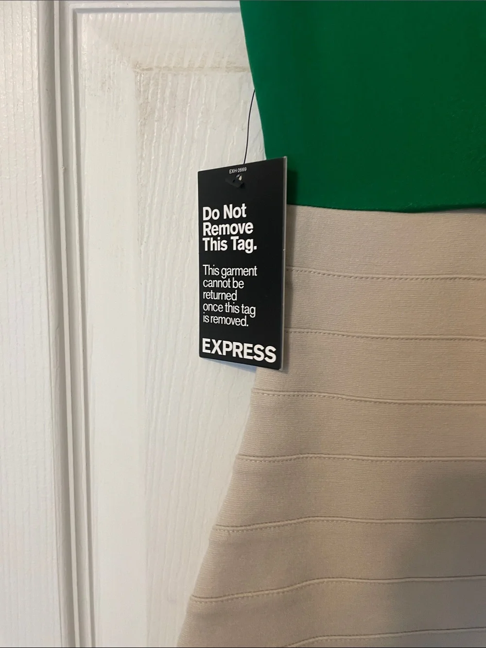 Express Green V-Neck Top with Cream Fitted Mini Skirt